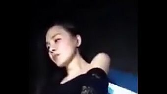 Chinese Girl'S Sensual Dance Performance In A Nightclub